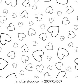 Patrón sin fisuras del corazón estilo Doodle. La decoración repetida de San Valentín, en blanco y negro.