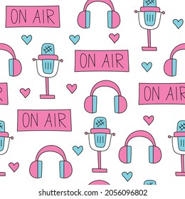 Doodle style. Microphone, headphones, a sign on air. Hand-drawn style in pink and blue. Seamless pattern on white