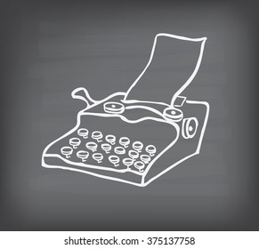doodle typewriter on blackboard