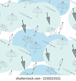 doodle umbrella contour. Seamless pattern with umbrellas on a blue background. Black and white. Doodle style folded and open umbrellas. Vector illustration