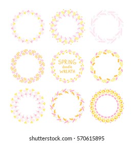 Doodle wreath. Vector hand drawn set of round floral wreaths. Spring flowers and leaves. Pink, yellow, lilac colors. Isolated. On white background.