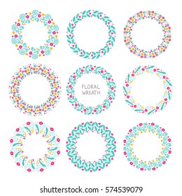 Doodle wreath. Vector hand drawn set of floral round wreaths. Isolated. On white background. Summer circle garland frame. Yellow, green, red, blue, violet colors.
