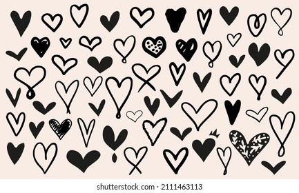 Doodled hearts collection. Different, hand drawn vector love signs seperatly icons in a bundle.