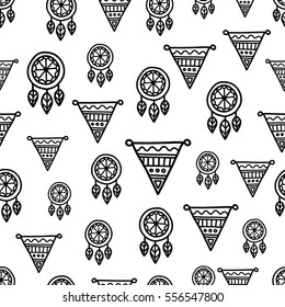 Doodles cute seamless pattern. Black vector background. Illustration with dreamcatcher and flags. Design for T-shirt, textile and prints.