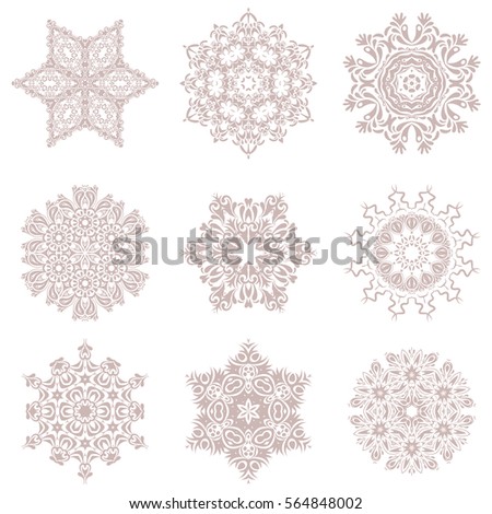 Doodles. Set of beautiful vector neutral snowflakes isolated on a white background. Falling Christmas stylized snowflakes. Snowflakes, snowfall.