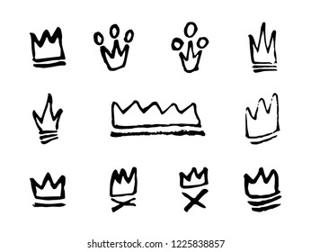 Doodles set of hand drawn crowns. Vector illustration