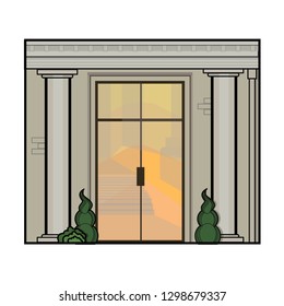 Door and columns. Lght in window. Classical architecture. Part of facade