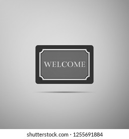 Doormat with the text Welcome icon isolated on grey background. Welcome mat sign. Flat design. Vector Illustration