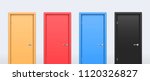 The doors of different bright colors on a gray wall