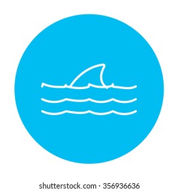 Dorsal shark fin above water line icon for web, mobile and infographics. Vector white icon on the light blue circle isolated on white background.