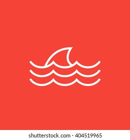 Dorsal shark fin above water line icon.