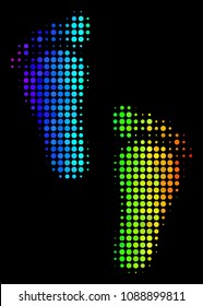 Dot bright halftone human steps icon in rainbow color tones with horizontal gradient on a black background. Colorful vector mosaic of human steps symbol made of circle points.