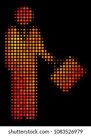 Dot businessman icon. Bright pictogram in orange color tinges on a black background. Vector halftone composition of businessman pictogram designed with circle dots.