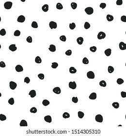 Dot doodles seamless pattern. Hand drawn circles texture. Polka dots.