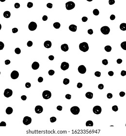 Dot doodles seamless pattern. Hand drawn circles texture. Dots background.