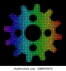 Dot impressive halftone cogwheel icon drawn with spectral color tinges with horizontal gradient on a black background.