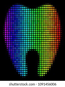 Dot impressive halftone tooth icon in spectrum color tinges with horizontal gradient on a black background. Colored vector mosaic of tooth pictogram combined from round cells.
