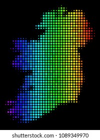Dot Ireland Island map. Halftone geographical plan in spectral color tinges with horizontal gradient on a black background. Vector concept of Ireland Island map organized of circle items.