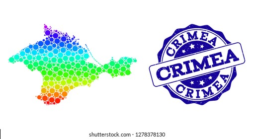 Dot rainbow map of Crimea and blue grunge round stamp seal. Vector geographic map in bright rainbow gradient colors on a white background.