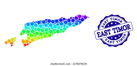 Dot rainbow map of East Timor and blue grunge round stamp seal. Vector geographic map in bright rainbow gradient colors on a white background.