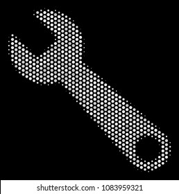 Dot white wrench icon on a black background. Vector halftone concept of wrench pictogram formed with circle dots.