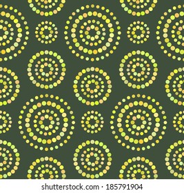 Dots circles seamless pattern on green