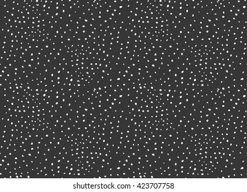 Dots and splashes on black.Hand drawn with ink seamless background. Fabric design. Textile collection.Seamless pattern with rough inked strokes.