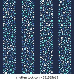 Dots vector seamless pattern. Indigo, blue, emerald green colors. Abstract geometrical striped background. Wide streaks made of hand drawn spots of various size. Stripes with tiny circles texture.