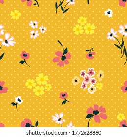 Dotted floral print on yellow background. Seamless vector pattern. Vintage print with small inflorescences. Retro textile collection.