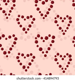 Dotted hearts seamless pattern. Seamless texture with hand drawn dotted hearts. Vintage red hearts on pink background. Use: textile, wallpaper, wrapping paper, greeting card, Valentine`s day 