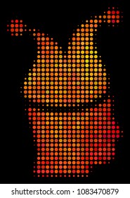 Dotted joker icon. Bright pictogram in hot color variations on a black background. Vector halftone mosaic of joker pictogram combined with circle items.