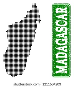 Dotted map of Madagascar Island and grunge caption. Vector green title inside rounded rectangle and grunge rubber texture.