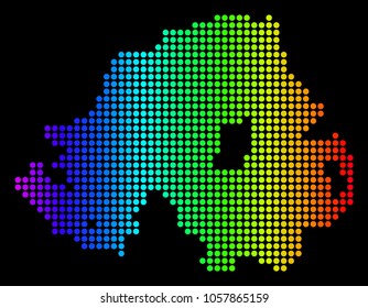 Dotted pixel Northern Ireland Map. Vector geographic map in bright spectrum colors on a black background. Multicolored vector concept of Northern Ireland Map designed of circle dots.
