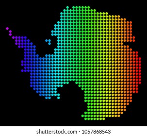Dotted pixelated Antarctica Map. Vector geographic map in bright spectrum colors on a black background. Multicolored vector composition of Antarctica Map composed of round dots.