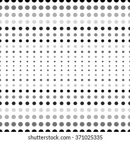 Dotted, polka dot black and white seamlessly repeatable pattern.