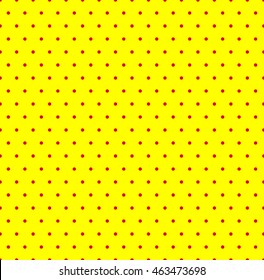 Dotted repeatable popart like duotone pattern. Speckled red yellow pointillist background. Seamlessly repeatable. 