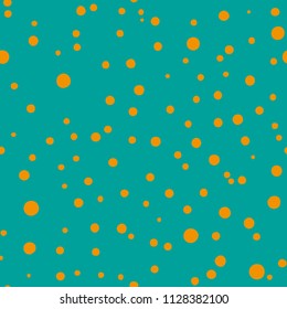 Dotted seamless pattern. Yellow dots on blue-green background. Fabric, wrapping print. Vector illustration.