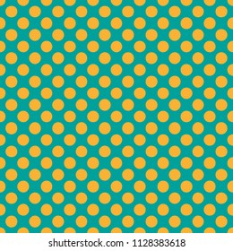 Dotted seamless pattern. Yellow dots on blue-green background. Fabric, wrapping print. Vector illustration.
