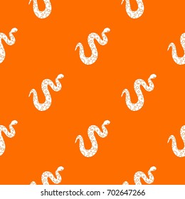Dotted snake pattern repeat seamless in orange color for any design. Vector geometric illustration