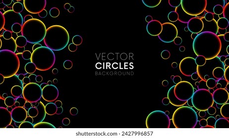 Double border with colorful rainbow random flying glowing circles, spheres or bubbles. Luminous floating balls shine with rainbow colors on black. Fluorescent circle particles. Vector background