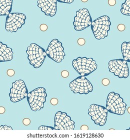 double seashells and pearls surface print design on pastel blue background