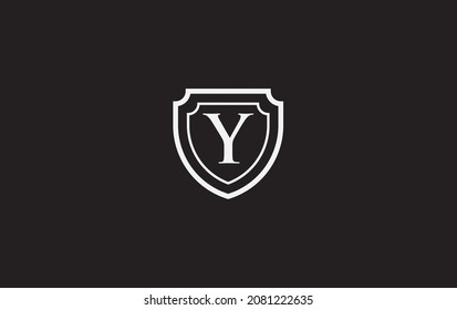 Double shield and golden elegant logo, art, symbol design with alphabet for professional brand and business