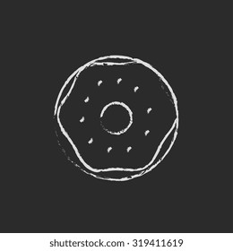 Doughnut hand drawn in chalk on a blackboard vector white icon isolated on a black background.