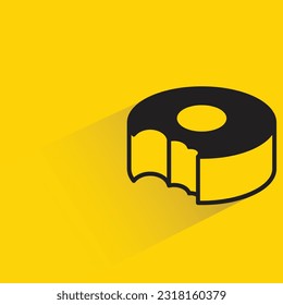 doughnut with shadow on yellow background