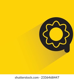 doughnut with shadow on yellow background