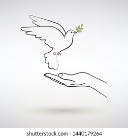 dove of peace flies to the open palm of man on a light background