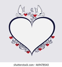Doves with heart shaped frame.