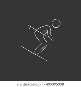 Downhill skiing. Drawn in chalk icon.