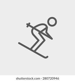 Downhill skiing icon thin line for web and mobile, modern minimalistic flat design. Vector dark grey icon on light grey background.