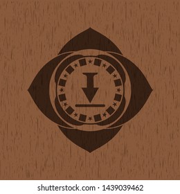 download icon inside badge with wooden background